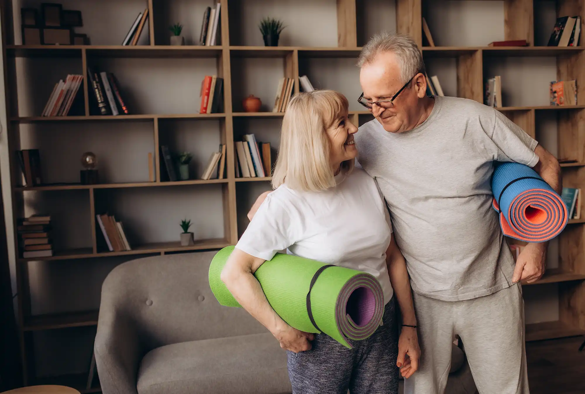 Senior couple getting ready to do yoga